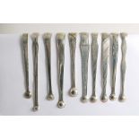 ROUND BOWLS:- Ten various pairs of George III sugar tongs, all with circular bowls (some