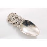 A CONTEMPORARY SCOTTISH CADDY SPOON with a Tudor rose & leaf handle & an egg-shaped bowl, by R.E.