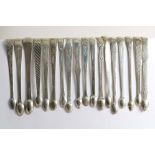 BRIGHT-CUT:- Eighteen pairs of George III sugar tongs (many with initials), mixed makers, all London