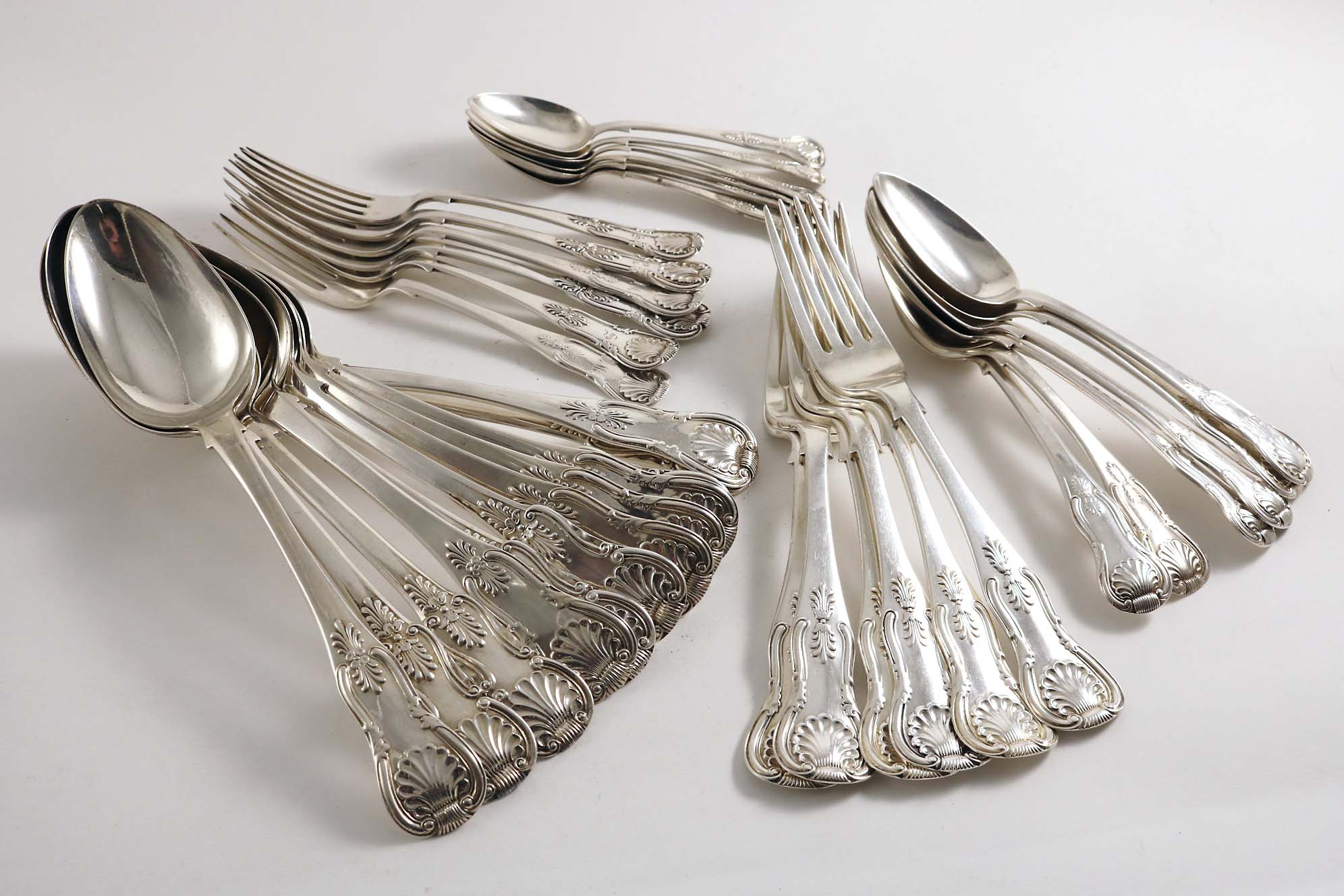 A COLLECTED OR HARLEQUIN PART SERVICE OF KING'S PATTERN FLATWARE (Single struck with shoulders),