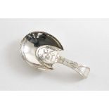 A GEORGE III "PASTERN HOOF" CADDY SPOON with a galleried bowl and "pricked" engraving, by Cocks &