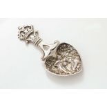 A LATE VICTORIAN SCOTTISH CADDY SPOON with an openwork crown finial and a heart-shaped bowl with a