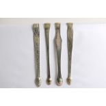 INCUSE DUTY MARK:- Four pairs of George III sugar tongs by various makers (one pair initialled),