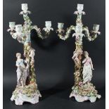 PAIR OF SITZENDORF FOUR LIGHT CANDELABRA, modelled as classical maidens and cherubs beside floral