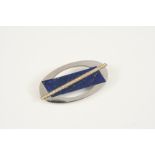 A LAPIS LAZULI AND DIAMOND BROOCH BY CARTIER the geometric design is set with lapis lazuli mounted