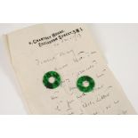 TWO MOTTLED GREEN JADE DISCS each 2.2cm. dia. Provenance: Accompanied by a letter from a member of