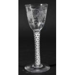 ENGLISH WINE GLASS, circa 1770, the rounded funnel bowl engraved with fruiting vines on a stem