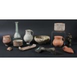 ANTIQUITIES: a mixed collection to include a Roman Glass unguentarium, Roman pottery fragments,