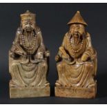 PAIR OF CHIINESE STONE CARVINGS, early 20th century, the two immortals or wise men seated on tiger