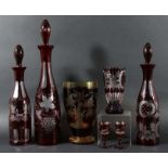 COLLECTION OF BOHEMIAN STYLE RED FLASH GLASSWARE, to include a pair of decanters and stoppers,