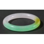 CHINESE 'JADE' BANGLE, green, yellow and mauve, diameter 8.5cm