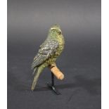 COLD PAINTED BRONZE PARROT a cold painted bronze parrot, mounted on a wooden perch and metal