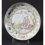 CHINESE FAMILLE ROSE SAUCER DISH, probably Qianlong, enamelled with four men seated around a table