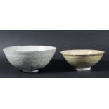 TWO PROVINCIAL BOWLS, Chinese or South East Asian, perhaps 17th century, both in a grey/celadon