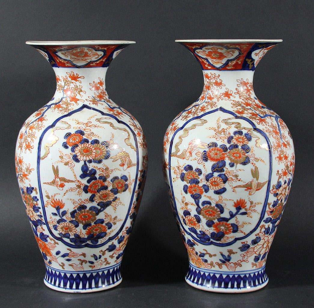 PAIR OF JAPANESE IMARI VASES, 19th century, of baluster form, decorated with ogee panels of