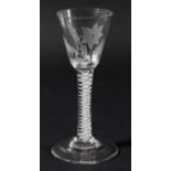 ENGLISH WINE GLASS, circa 1770, the rounded funnel bowl engraved with a flower and foliage on a stem