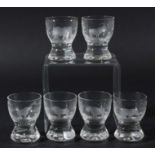 SET OF SIX SAFARI SHOT GLASSES, probably by Rowland Ward, engraved with various animals, height 6cm;