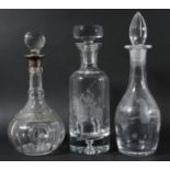 SILVER MOUNTED GLOBE AND SHAFT DECANTER AND STOPPER, with faceted neck and body, engraved with a