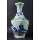CHINESE CELADON VASE, of baluster form, decorated in underglaze blue and copper red with an immortal
