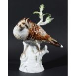 MEISSEN FIGURE OF A WOODCOCK, 20th century, perched on a branch, blue crossed sword and incised