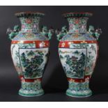 PAIR OF JAPANESE BALUSTER VASES, decorated in the famille verte palette with figural and mountain