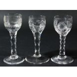 GROUP OF THREE ENGLISH WINE GLASSES, late 18th century, with ovoid bowls, one engraved with a