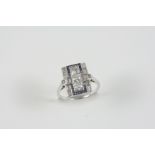 AN ART DECO SAPPHIRE AND DIAMOND RING the plaque ring is centred with three square-shaped old