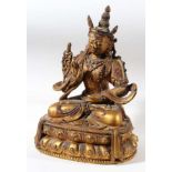 CARVED WOOD, LACQUER AND GILT BODHISATTVA, probably Chinese or Tibetan, seated cross legged on a