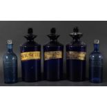 SET OF SEVEN 'BRISTOL' BLUE GLASS APOTHECARY JARS AND STOPPERS, mid 19th century, with gilt labels