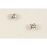 A PAIR OF DIAMOND STUD EARRINGS each brilliant-cut diamond weighs approximately 1.50 carats.