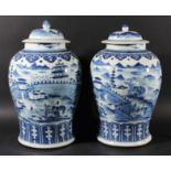 PAIR OF CHINESE BLUE AND WHITE VASES AND COVERS, Kangxi style but 19th century, painted with figures