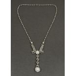 AN EDWARDIAN DIAMOND AND PEARL NECKLACE the foliate scrolling necklace is mounted with rose-cut