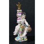 CHELSEA STYLE TOY SCENT BOTTLE, late 19th or 20th century, modelled as two cherubs and a garland