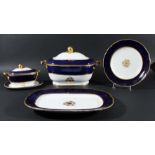 COAPLORT BLUE AND GILT PART DINNER SERVICE, with gilt fruit finials and stylised foliate decoration,