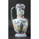 DELFT FLAGON OR EWER, late 18th or 19th century, of baluster form with trefoil cover, painted with