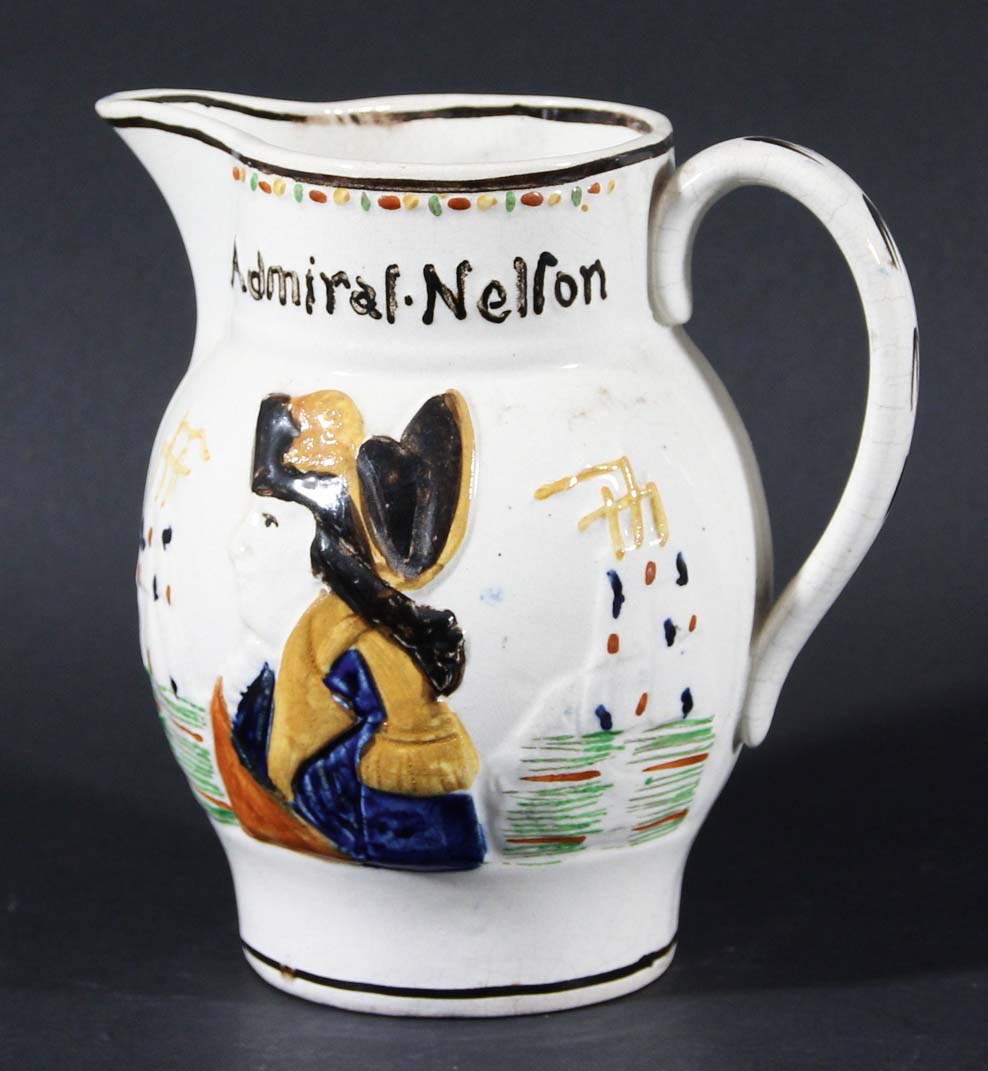 ADMIRAL NELSON AND CAPTIAN HARDY, prattware style jug moulded with busts of Nelson and Hardy with