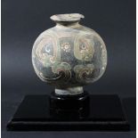 CHINESE COCOON VASE, probably Han Dynasty, painted with scrolling decoration on a black ground, with