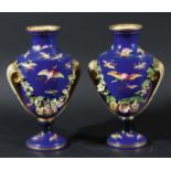 PAIR OF SEVRES STYLE VASES, 19th century, of baluster form with encrusted floral swags and scrolling