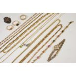 A QUANTITY OF GOLD JEWELLERY including a 9ct. gold and gem set bracelet, a lady's 9ct. gold