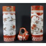 PAIR OF JAPANESE KUTANI VASES, of cylindrical form, with bird in foliage decoration, iron red