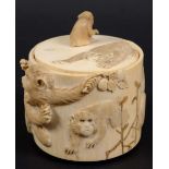 JAPANESE IVORY BOX AND COVER, Meiji, carved with monkeys eating fruit, with a seated monkey