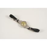 AN ART DECO LADY'S DIAMOND WRISTWATCH the octagonal-shaped dial with Arabic numerals and with