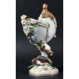 MEISSEN STYLE BACCHANALIAN CUP, modelled as a nautilus shell with satyr and grape mask, surmounted