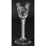 ENGLISH WINE GLASS, circa 1770, the rounded funnel bowl engraved with various flowers on a stem with