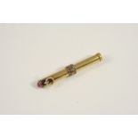 A GOLD AND GEM SET PROPELLING PENCIL the gold pencil mounted with rose-cut diamonds and with