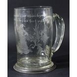 GERMAN GLASS TANKARD, late 18th or 19th century, of tapering cylindrical form with spreading foot