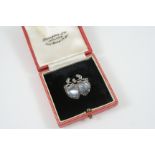 A VICTORIAN MOONSTONE AND DIAMOND DOUBLE HEART BROOCH the two heart-shaped moonstones are set within