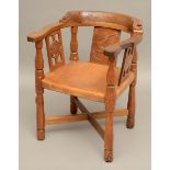 ROBERT THOMPSON OF KILBURN - MOUSEMAN MONKS CHAIR a circa 1920s/1930s oak Monk's armchair with