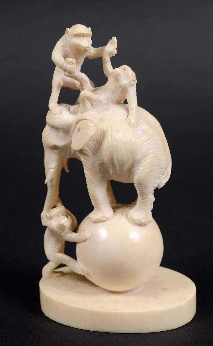 JAPANESE IVORY OKIMONO, Meiji, carved as an elephant and three monkeys balancing on a ball, height