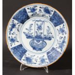 DUTCH DELFT BLUE AND WHITE PLATE, Het Bijltje, 18th century, painted with a central floral panel